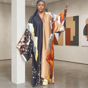 Elegant floor-length satin kimono with artistic floral and abstract prints