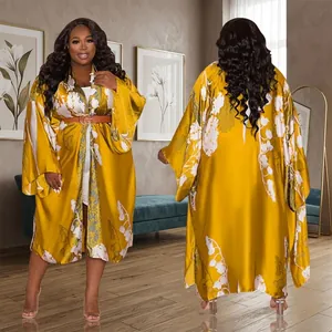 Detailed front and back view of a women's yellow floral print long-sleeved kimono cardigan