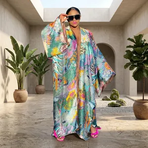 Detailed view of the vibrant multi-colored floral print on this loose long-sleeve kimono robe