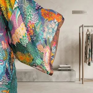 Macro detail showing the vibrant floral print and wide sleeve of this kimono jacket