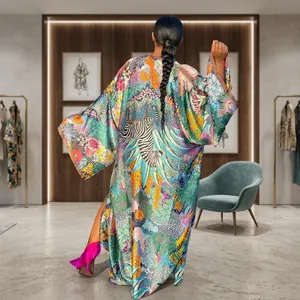 Back view of women's colorful tropical floral print loose kimono cardigan with zebra motif