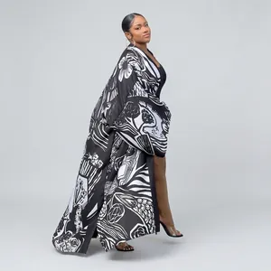Stylish long kimono cardigan with bold black and white abstract print for women.
