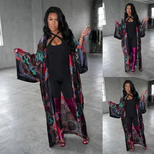 Detailed view of long floral print kimono cardigan with vibrant geometric patterns
