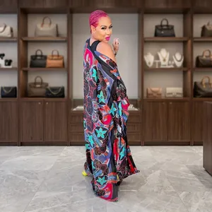 Detailed visual of the vibrant floral pattern on this long loose kimono cardigan for women