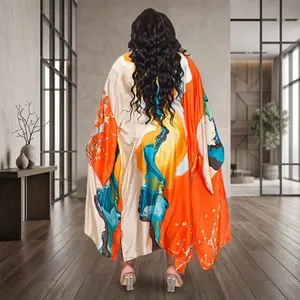 Back view of a vibrant orange printed loose kimono robe for autumn women's fashion