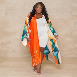 Full-length view of vibrant women's autumn printed loose casual kimono cardigan