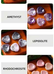 Detailed view of heart-shaped massage stones in amethyst, lepidolite, and rhodochrosite.