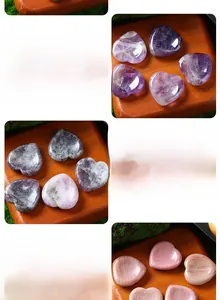 Detailed view of heart-shaped massage stones in amethyst, lepidolite, and rhodochrosite.