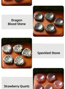 Detailed view of 30mm heart-shaped worry stones in various natural crystals and agates