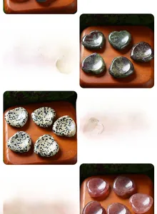 Detailed view of 30mm heart-shaped worry stones in various natural crystals and agates