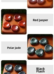 Selection of natural 30mm heart-shaped worry stones and crystal massage palm stones
