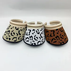 Three colors of women's leopard print knitted sun visor hats for summer beach protection