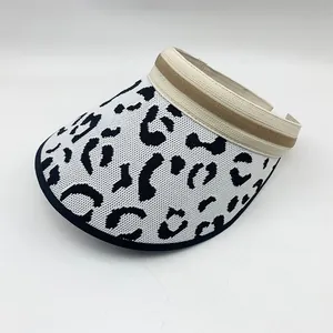 Macro detail of the stylish leopard print knitted empty top sun visor for beach