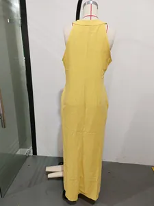 Back view of a loose fit yellow sleeveless cotton linen maxi dress on a mannequin