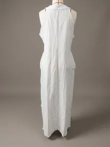 Back view of a casual white sleeveless cotton linen maxi dress shown on a mannequin.