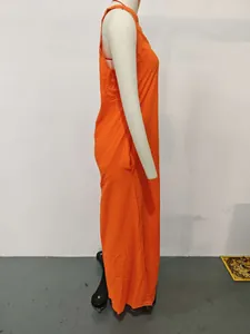 Detailed side view of a vibrant orange sleeveless cotton linen maxi dress with pockets