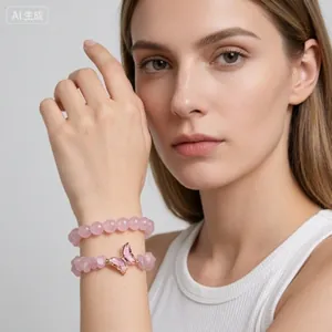 Elegant pink natural crystal bead bracelet set featuring a delicate butterfly charm