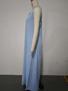 Detailed side view of light blue sleeveless cotton linen maxi dress with pockets