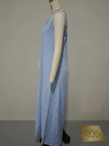 Detailed side view of light blue sleeveless cotton linen maxi dress with pockets