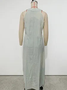Back view of a casual light green sleeveless cotton linen maxi dress for women.