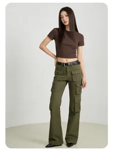 Full-body view of a model wearing a slim brown crop top and olive green cargo pants