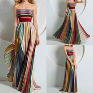Multi-angle view of a colorful strapless pleated maxi dress with vertical stripes.