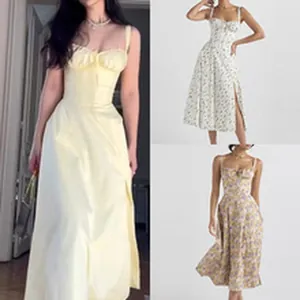 Detailed view of elegant sleeveless floral maxi dresses with a high side slit for summer