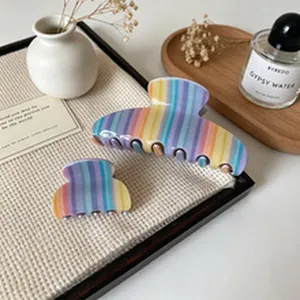 Rainbow striped dopamine hair claw clip set for colorful hairstyling detail