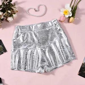 Close-up of stylish silver faux leather skort featuring a bold crocodile texture
