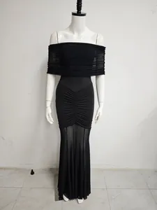Full view of black mesh patchwork maxi dress featuring off-shoulder ruched bodycon fit
