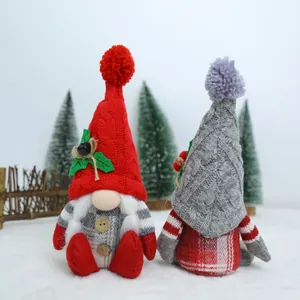 Handmade Christmas faceless gnome plush dolls with festive knitted hats and pom-poms