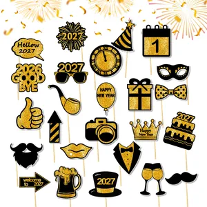 Glittery gold and black 2027 New Year party photo booth props set for celebration