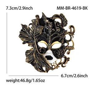 Detailed ornate enamel masquerade mask brooch in black and gold with measurements