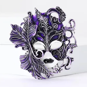 Exquisite purple enamel carnival mask brooch with intricate silver leaf detailing