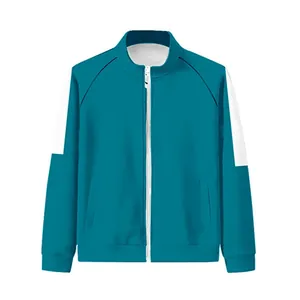 Vue détaillée d'un sweat à capuche sport pour enfants vert foncé avec panneaux blancs