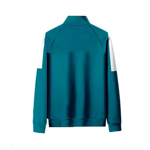 Vue arrière de la veste de sport verte pour enfants avec col montant et empiècements