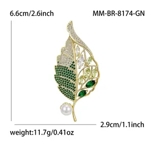 High-end elegant gold leaf brooch with micro-paved green zircons and pearl accent