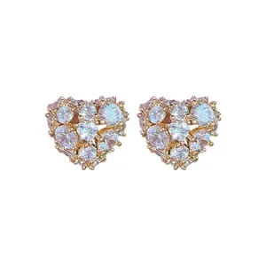Elegant 18K gold-plated heart stud earrings featuring shimmering cubic zirconia stones
