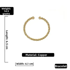 Detailed size measurements for this textured gold-colored open cuff bangle bracelet