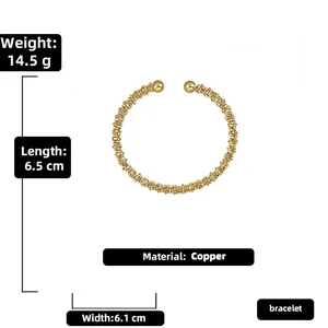 Detail view of textured gold copper open cuff bracelet with weight and size info