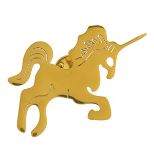 Detailed macro view of an elegant gold unicorn-shaped stainless steel brooch pin