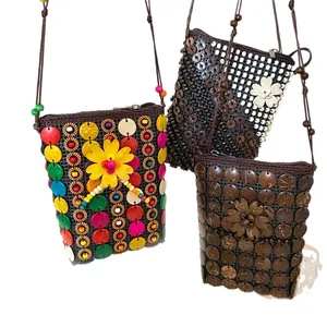 Handmade Bohemian coconut shell woven mini coin purses with floral ethnic design