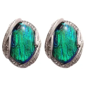 Boucles d'oreilles vintage avec résine verte irisante et strass brillants