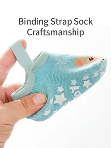 Anti-slip baby floor socks with secure elastic strap and cute cartoon star pattern design