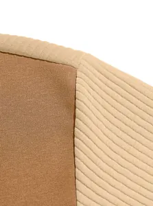 Close-up detail of fleece fabric texture and ribbed shoulder seam on men's sweatshirt