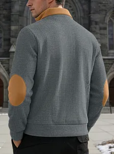 Close-up rear view of grey ribbed men's sweatshirt featuring camel color elbow patches.