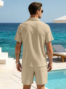 Back view of a men's beige rib-knit short sleeve shirt and shorts beach vacation set