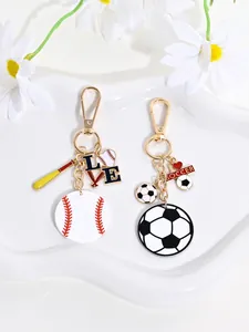 Close-up detail of sports-themed keychains featuring soccer and baseball charms