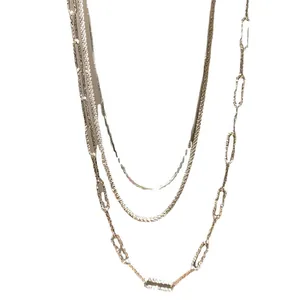 Elegant layered S925 silver necklace featuring a sparkling gold-tone snake chain