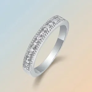 Elegant minimalist 925 sterling silver moissanite ring featuring a pave-set stone band